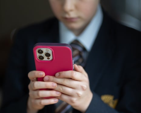 Classroom with students at desks without mobile phones