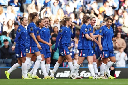 Chelsea players celebrate scoring a goal against London City Lionesses during last season’s WSL.