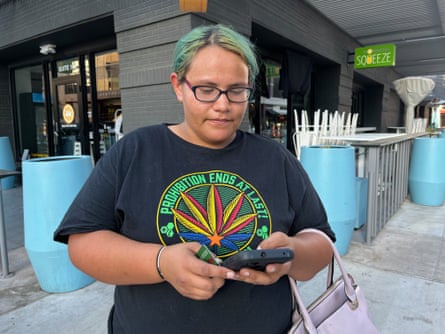 Alexia Gonzales, 26, shopping for an Instacart customer in downtown Phoenix as the temperature hit 113F.