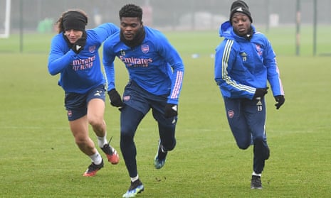 Thomas Partey (centre) with David Luiz and Nicolas Pépé during an Arsenal training session this week.