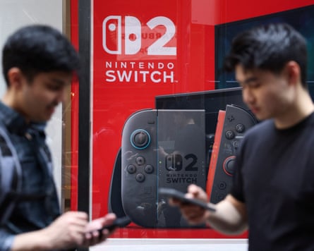 People wait outside the Nintendo Store for the release of the Nintendo Switch 2.