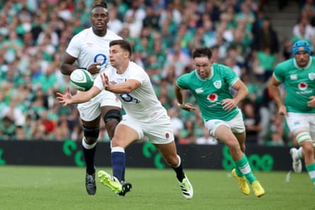 England's scrum-half Ben Youngs passes the ball against Ireland