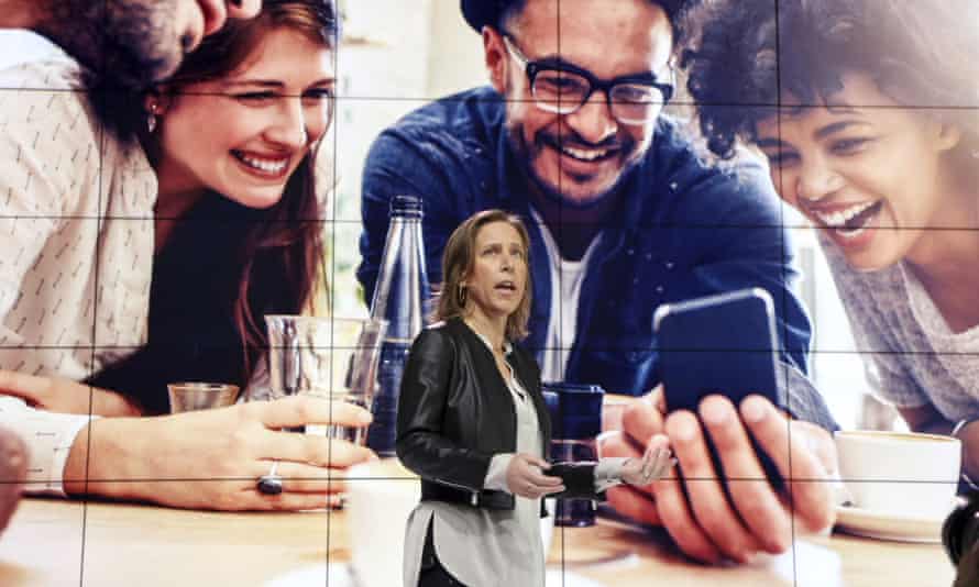 YouTube CEO Susan Wojcicki speaking in front of company publicity at the Los Angeles office in 2017.