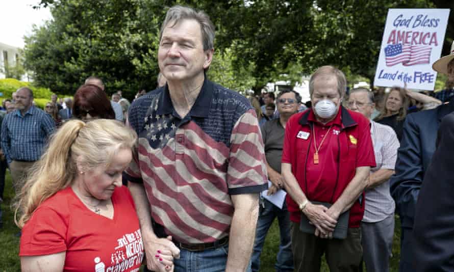 Conservative push to recruit election deniers as poll workers causes alarm | US voting rights 1 Jim Womack, now chair of the North Carolina Election Integrity Team and his wife, Sherry, pray on the legislative grounds in Raleigh in May 2020.