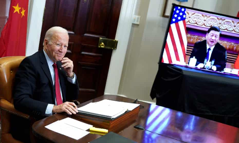 US President Joe Biden meets with China's President Xi Jinping during a virtual summit from the Roosevelt Room of the White House 