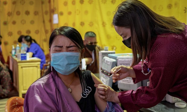 A woman is given the Covid-19 vaccine in Thimpu, Bhutan.