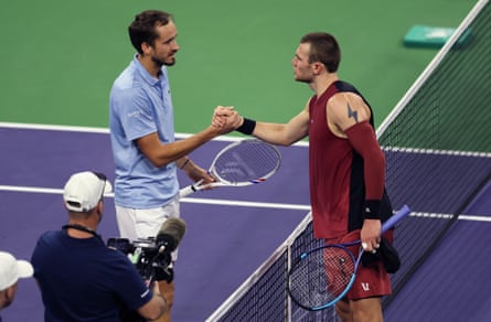 Jack Draper with Daniil Medvedev after his straight sets defeat.