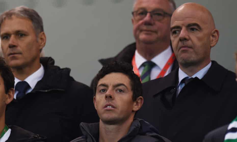 Gianni Infantino watches Northern Ireland’s game with San Marino sat behind Rory McIlroy