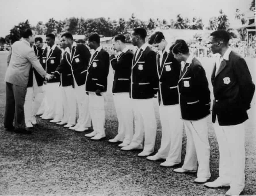 Governor Sir Robert Arundell shakes hands with members of the West Indian team before the start of the second Test at Bridgetown in February 1954.