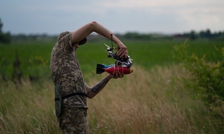 A Ukrainian soldier with a drone near the frontline in eastern Ukraine