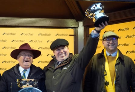 Grey Dawning’s owner Robert Kirkland, left, and trainer Dan Skelton, centre, after winning the Betfair Chase at Haydock in November.