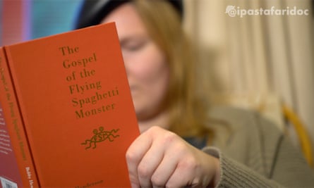 De Wilde reads the Gospel of the Flying Spaghetti Monster.