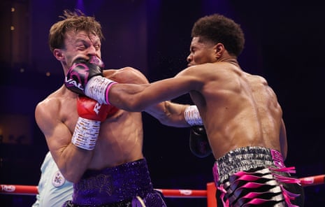 Shakur Stevenson, right, lands a shot on Josh Padley during their WBC lightweight title fight on Sunday morning in Riyadh.