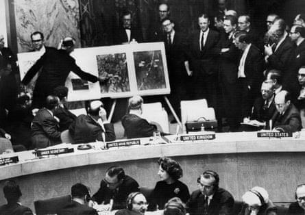 A US Administration official shows UN security council members an aerial view of one of the Cuban medium-range missile bases on 26 October 1962.