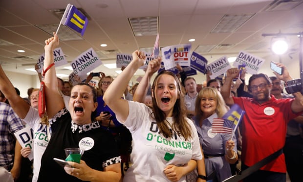 Supporters of Democratic candidate Danny O’Connor cheer in Westerville, Ohio Tuesday night. O’Connor lost, but the Democratic voter surge was significant. 