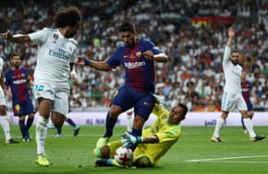 Luis Suarez is thwarted by Real Madrid’s keeper Keylor Navas.