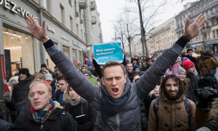 Russian opposition leader Alexei Navalny, centre, attends a rally in Moscow, Russia in 2018.