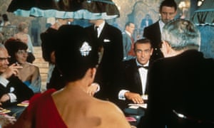 Sean Connery in Dr No, 1962, the first film featuring Ian Fleming’s secret agent, with Eunice Gayson playing Sylvia Trench.