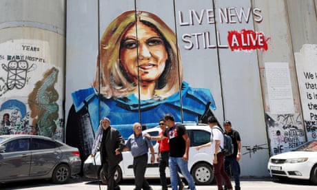 Mural of late Palestinian journalist Shireen Abu Aqleh<br>epa10054935 A mural of the late Palestinian journalist of Al Jazeera network Shireen Abu Aqleh on the Palestinian side of the Israeli separation wall, in the West Bank city of Bethlehem, 06 July 2022. American President Joe Biden is expected to visit Bethlehem next week and to pass by the wall during his visit. EPA/ABED AL HASHLAMOUN
