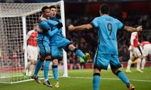 Messi celebrates with Neymar and Suarez.