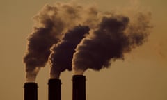 Emissions rise from smokestacks at a coal power plant