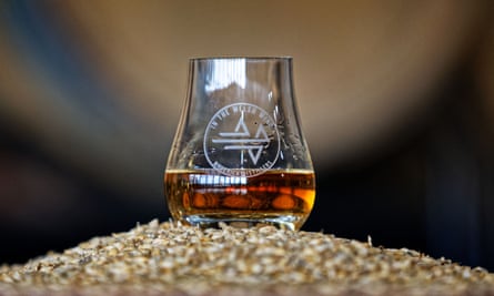 A whisky glass on the locally grown barley used to make the new whisky.