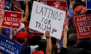A person holds a sign reading Latinos for Trump on the third day of the Republican National Convention in Cleveland, Ohio, on 20 July 2016.