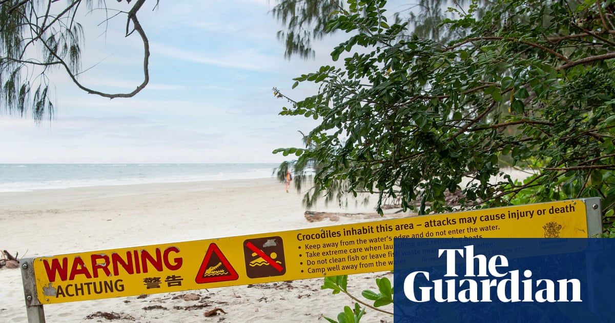 Boy, 14, in hospital after crocodile attack while fishing at far north Queensland beach