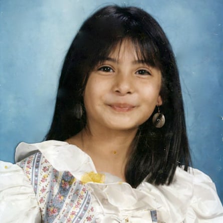 Photograph of Leanne Marie Hausberg, a smiling girl with dark hair