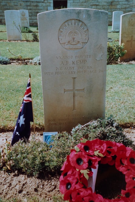 Albert Kemp’s gravestone, with flowers and a flag