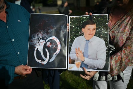 Protesters outside Southampton Central police station on 2 June, holding images of Henry Nowak and a pair of blood-covered handcuffs.