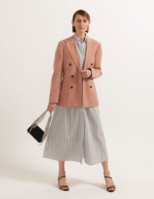 model wears dress, £345, by Raey, from matchesfashion.com. Blazer, £275, reiss.com. Sandals, £49, office.co.uk. Bag with rhinestones, £49.99, zara.com.