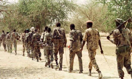 Sudanese rebel soldiers march to the front close to newly-developed oil fields in the south of Sudan.