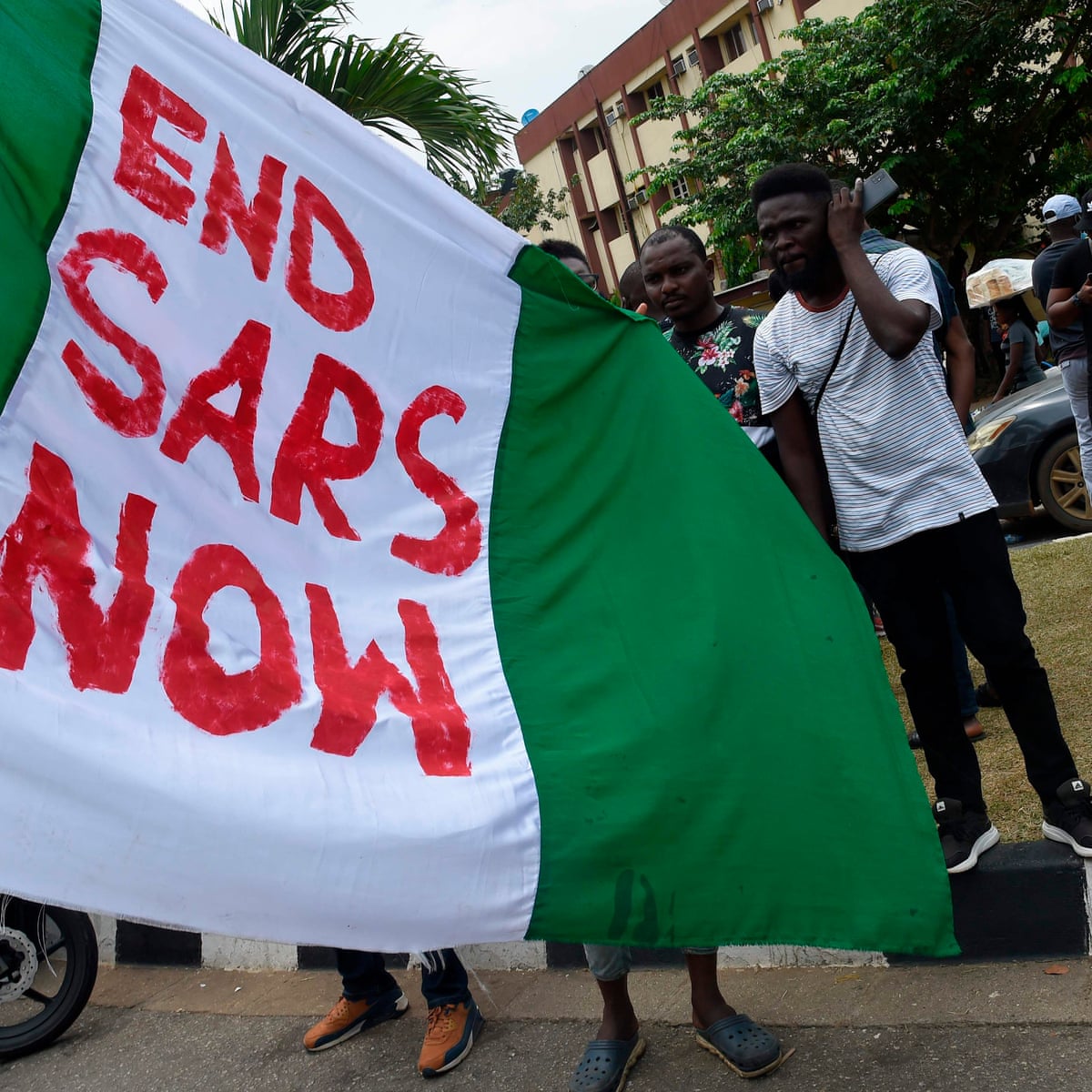 The lights went out and the shooting started': #EndSars protesters find no justice one year on | Global development | The Guardian