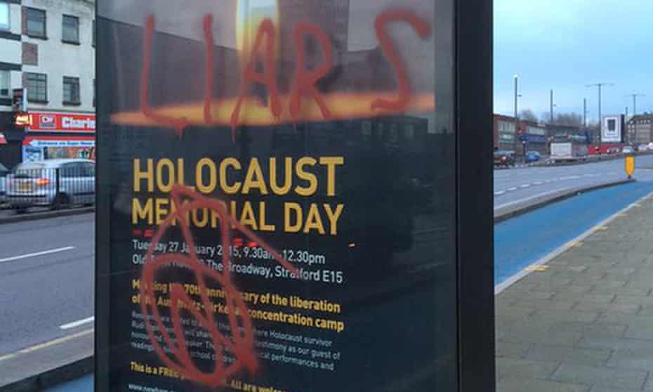 Graffiti on posters advertising Newham council’s Holocaust Memorial Day event in Stratford, London in January 2015.