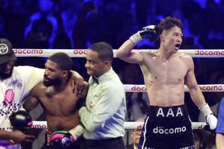 Naoya Inoue, right, dominated Stephen Fulton on Tuesday night in Tokyo.