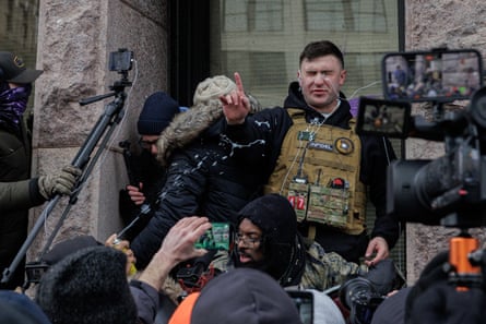 Jake Lang was confronted by several hundred counter-protesters on Saturday.