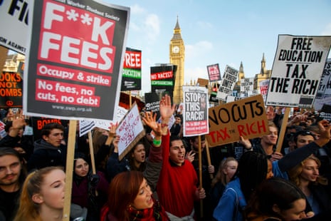 Students Demonstrate Over Tuition Fees in LondonLONDON, ENGLAND - NOVEMBER 19 : Thousands of students attend a march against tuition fees and spending cuts in London, England on November 19, 2014. (Photo by Tolga Akmen/Anadolu Agency/Getty Images)