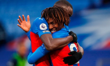 Crystal Palace’s Eberechi Eze is embraced by Cheikhou Kouyate after scoring his side’s second goal.