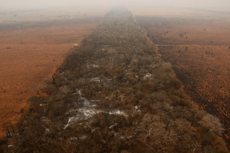 An aerial photograph shows an area affected by a fire in the Chaco region in Bahia Negra, Paraguay, 13 September 2024.