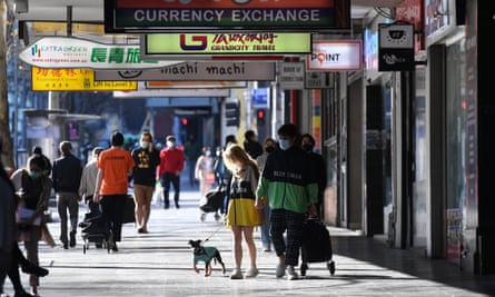 People are seen on Swanston Street in Melbourne, September 6, 2020.