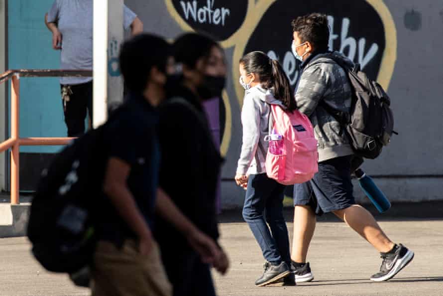 Students walk to their classrooms at a middle school in El Sereno, East Los Angeles, California,in September.