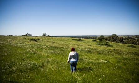 Tammi walks her land.