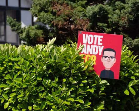 A ‘vote Andy’ placard among bushes and trees