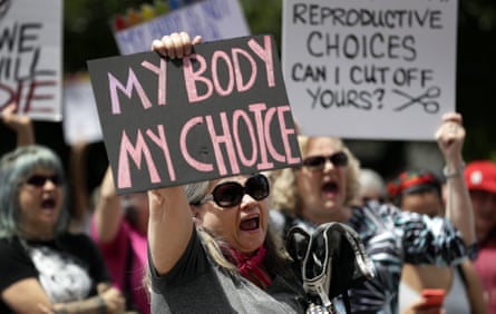 A group gathers to protest abortion restrictions at the state capitol in Austin, Texas, on 21 March 2019.