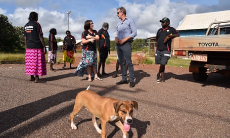 The Indigenous affairs minister, Nigel Scullion, with workers at a Community Development Program provider in Arnhem Land. A government review into the remote work-for-the-dole scheme has released damning findings. 