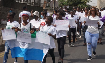 Anti female genital mutilation(FGM) campaigners march to end FGM in Sierra Leone on International Women’s Day in Freetown