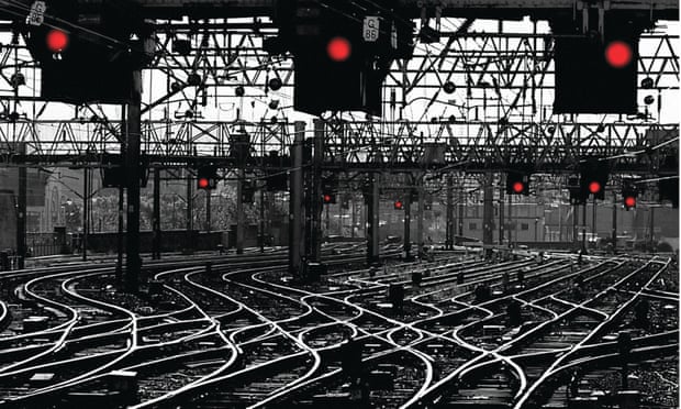 Red signals on railway tracks