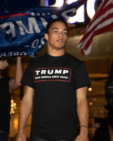 Christian Walker, son of Herschel Walker takes part in a ‘Gays and Allies For Trump’ march in Los Angeles in October 2020.