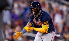 The Braves' Ronald Acuña Jr celebrates as he runs the bases after hitting a solo home run during the first inning of Friday’s game against the Nationals.